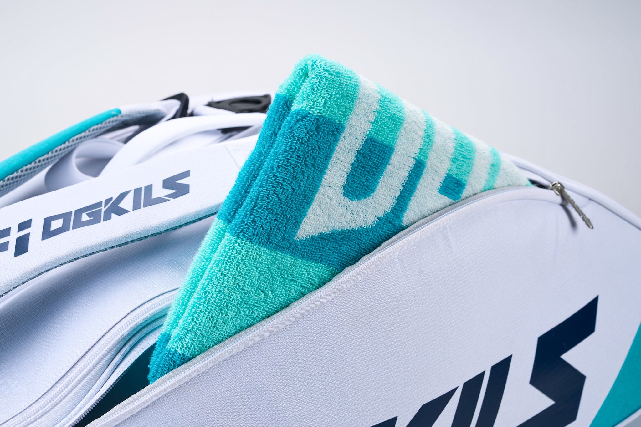 OGKILS Tournament Backpack white pocket with OGKILS towel